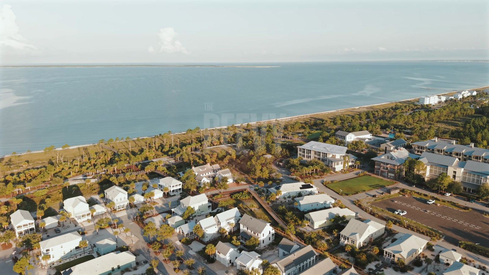 Aerial view along the Gulf Coast shoreline at sunrise