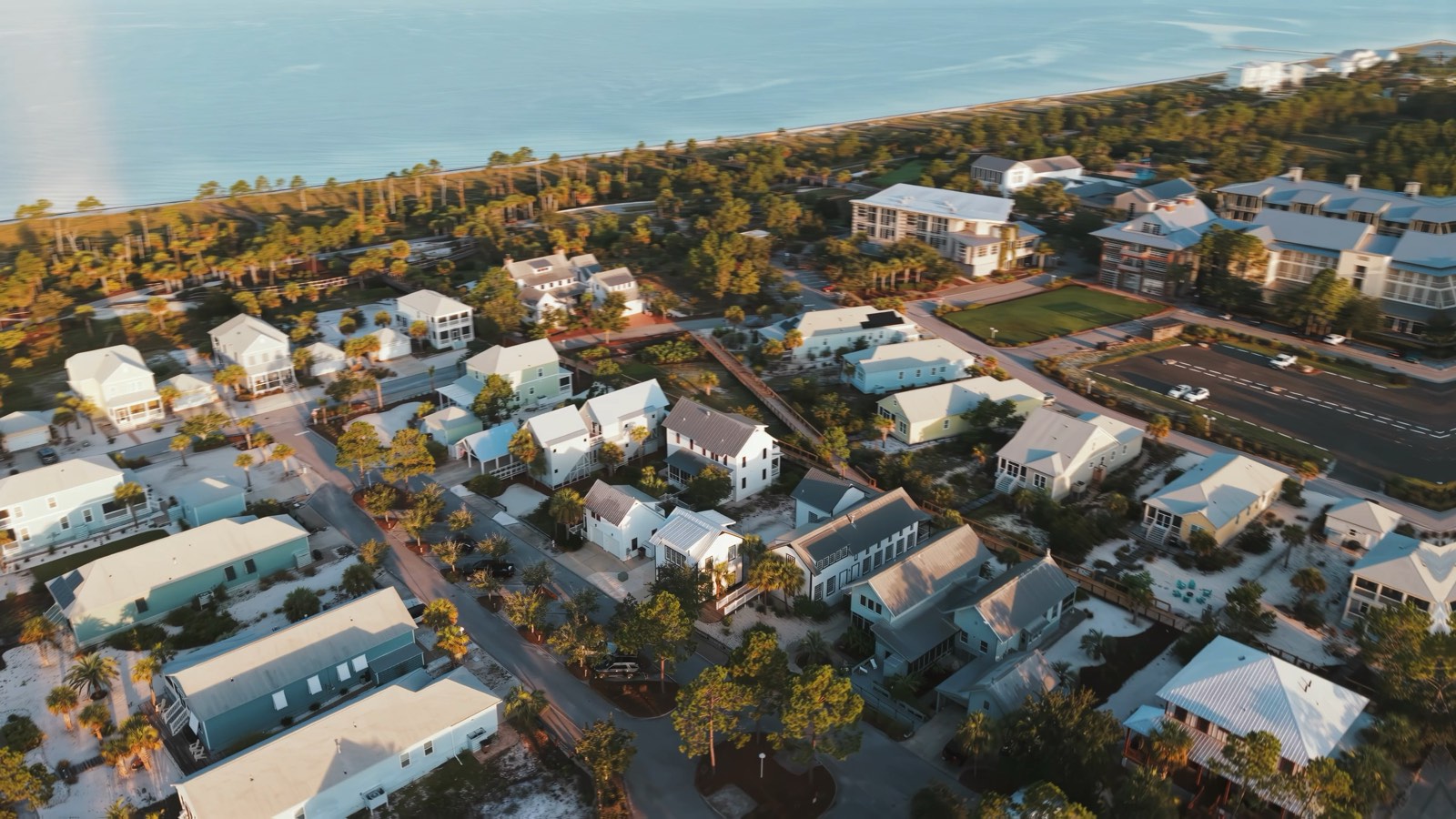Aerial view of the Gulf shoreline in golden light